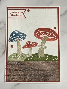 Handmade thank you card featuring toadstools stamped in Cajun Craze on a simple card background