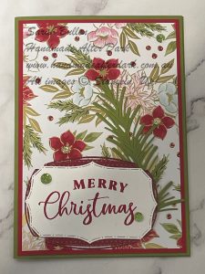 Handmade Christmas card with red and green accents featuring traditions of Christmas suite elements.