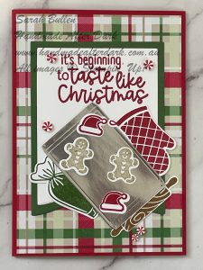 Handmade Christmas card featuring red and green holiday images with festive accents.