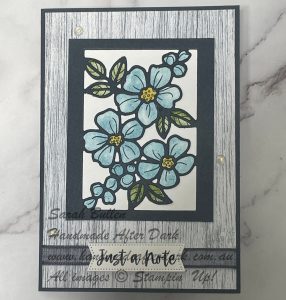 Handmade "Just a Note" card featuring layered floral stamps in Secret Sea colours.