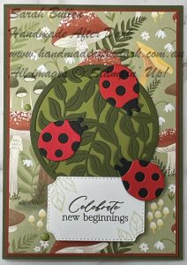 Bright handmade celebration card featuring springtime scenes with vibrant colours and layered details