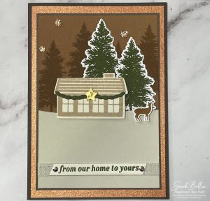 Rustic handmade Christmas cabin card made with the Stampin’ Up! Neutral Noel Suite with pine trees, deer and metallic accents.